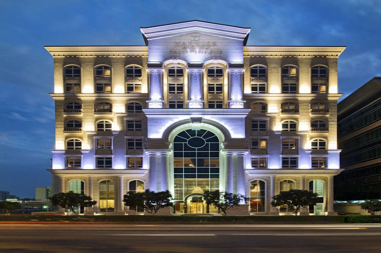 Warwick Doha Hotel Exterior photo The hotel at night