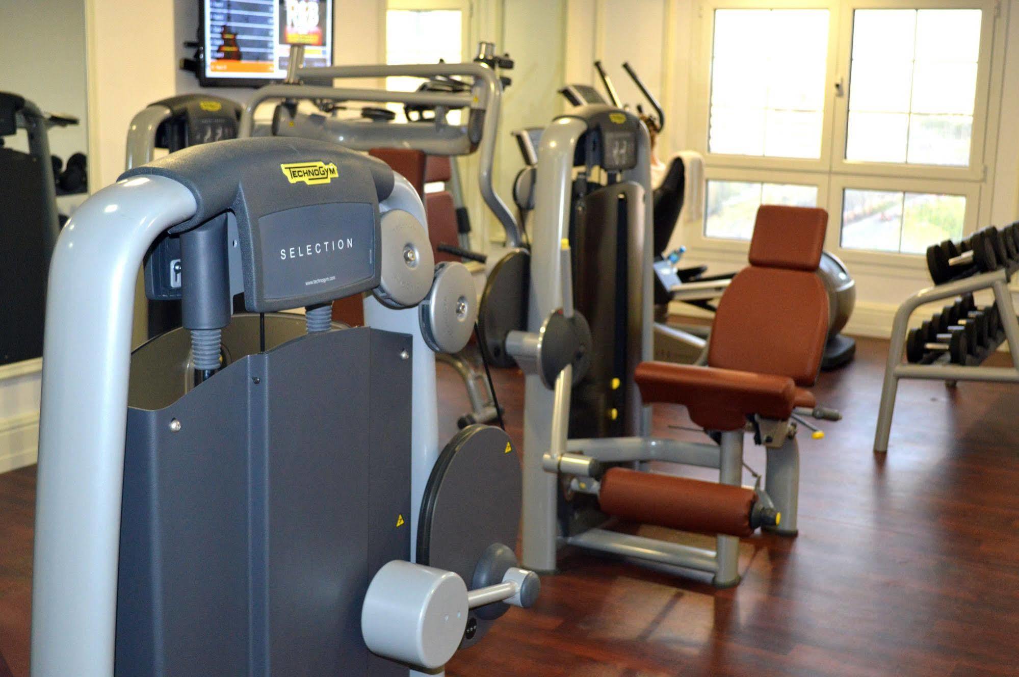 Warwick Doha Hotel Exterior photo A Technogym selection 1000 leg press machine